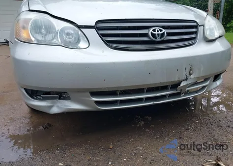 2004 Toyota Corolla Le z USA, uszkodzony, nr VIN JTDBR32E642048055